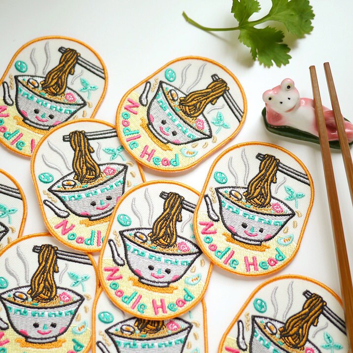 Noodle Head Iron On Patch - Gold edition